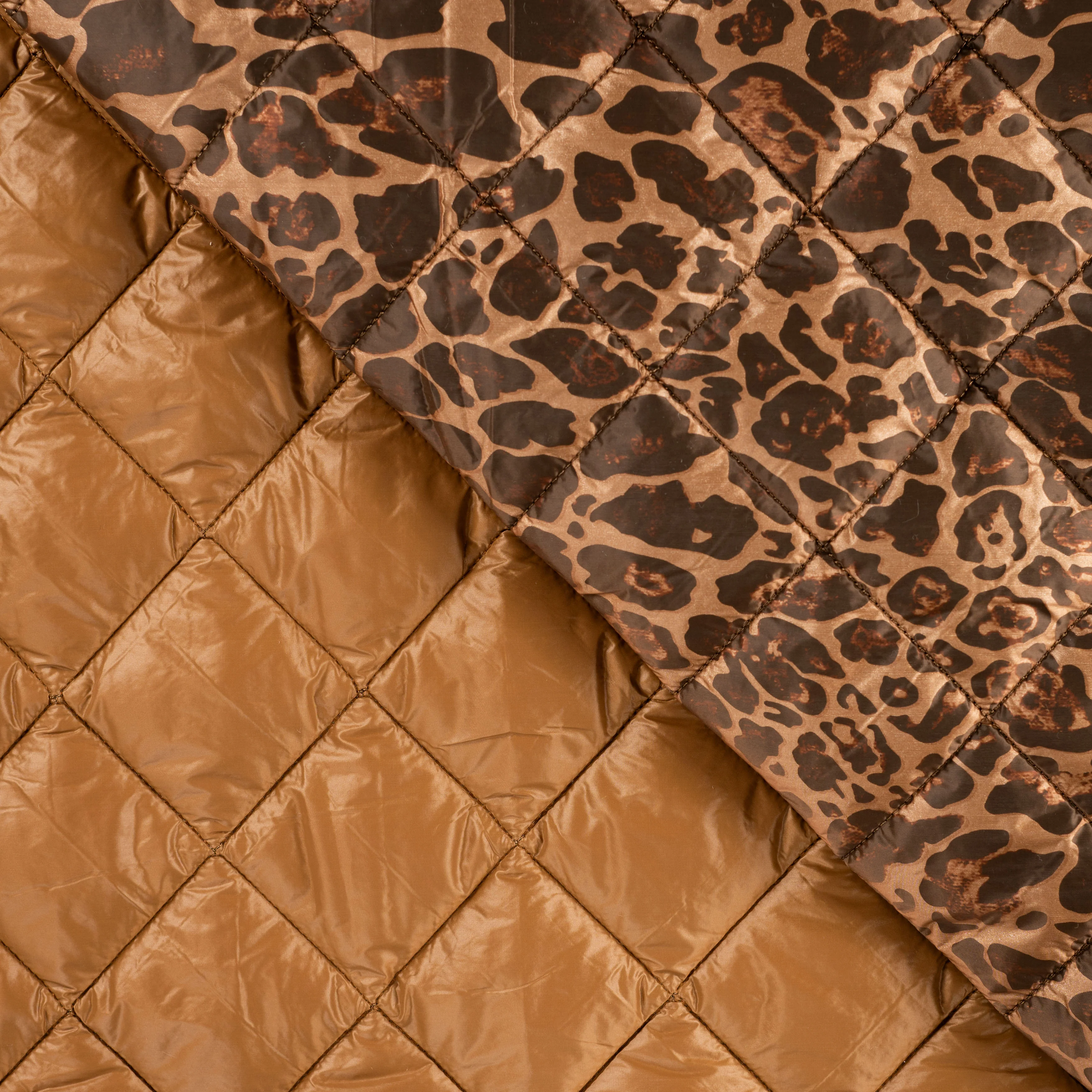 REMNANT 0.76 Metre - Animal print with Diamonds Quilted Puffer Fabric - Image 4