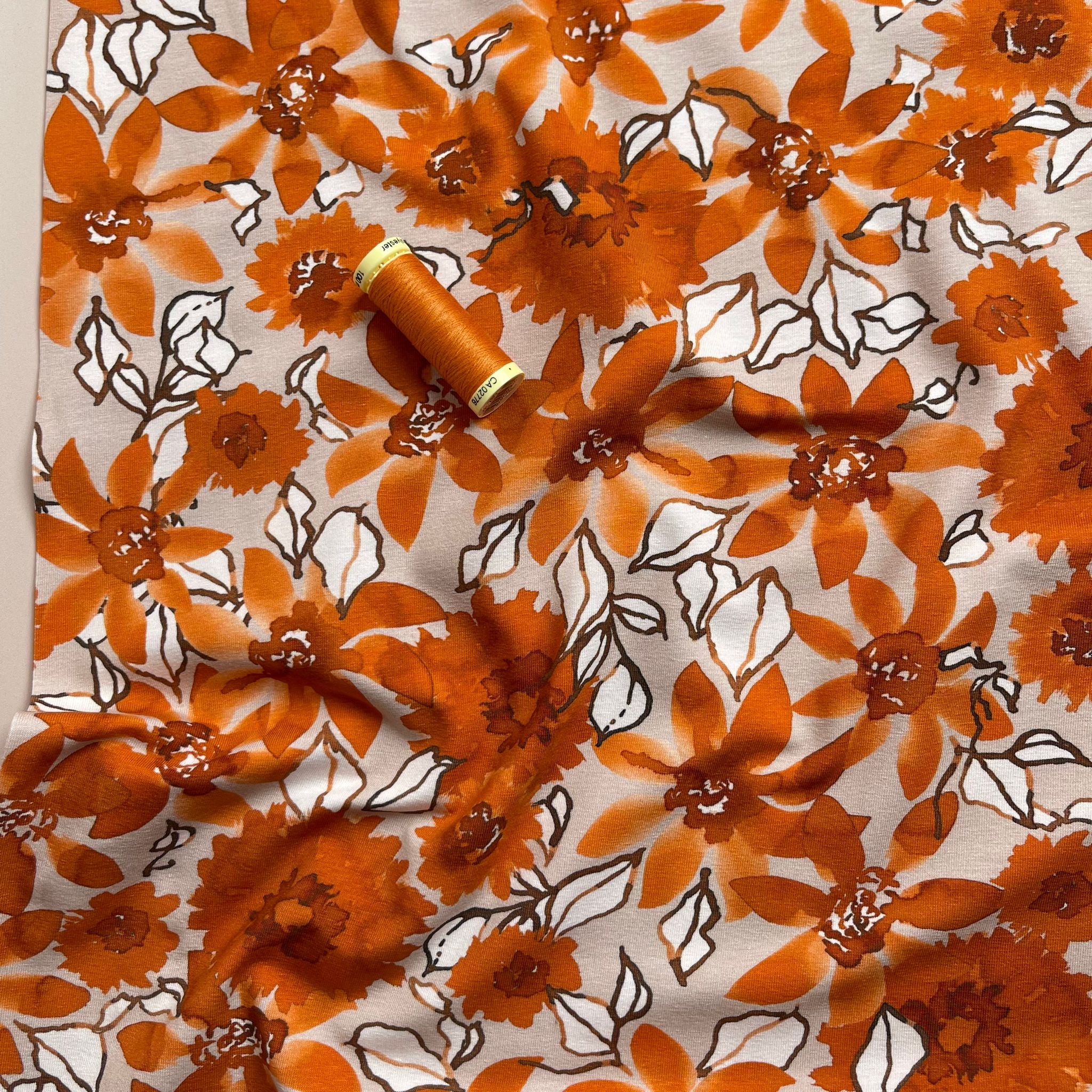 Danish Design - Rust Flowers on Pale Rose Cotton Jersey Fabric - Image 6