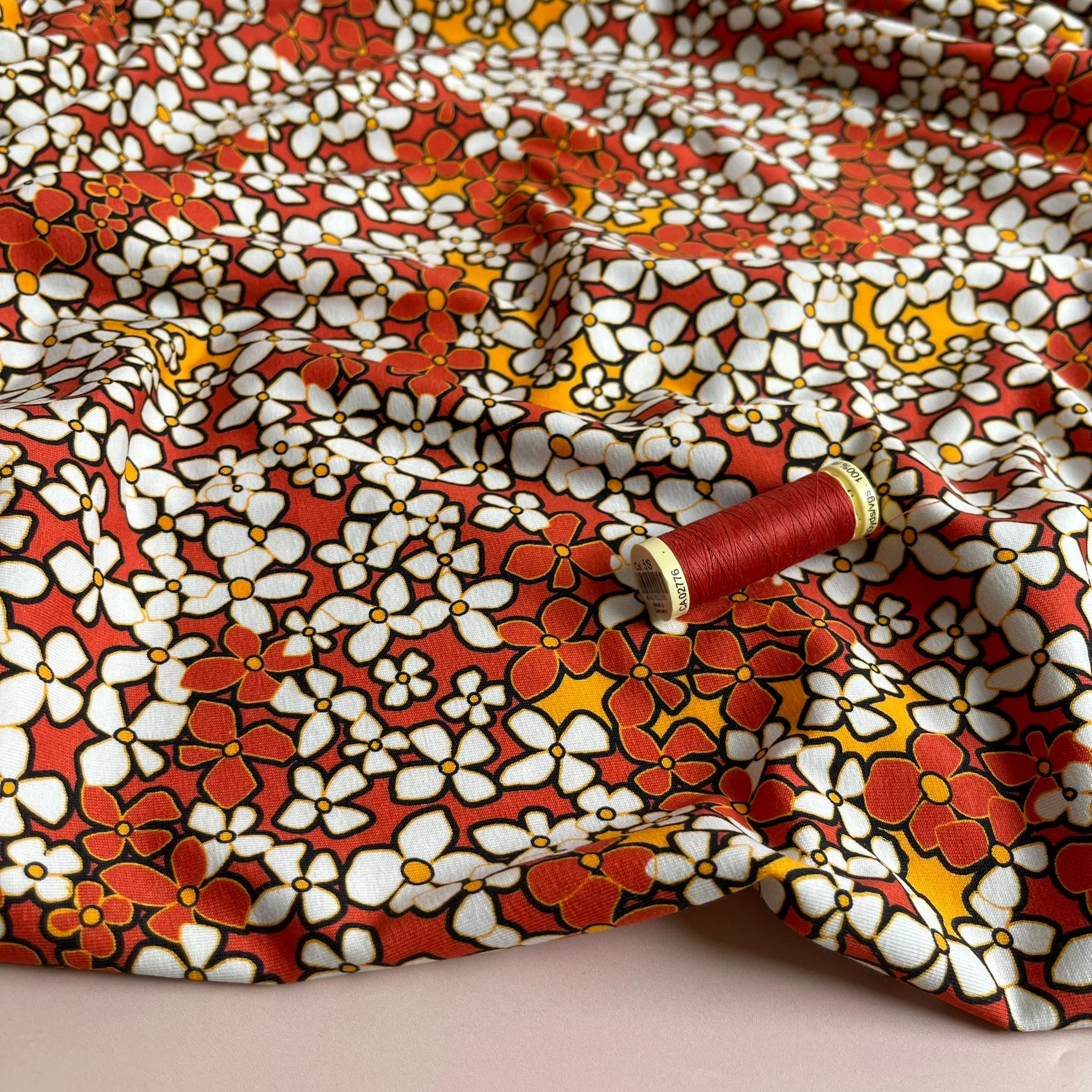 Danish Design - Small Retro Flowers on Burnt Orange Cotton Jersey Fabric - Image 4