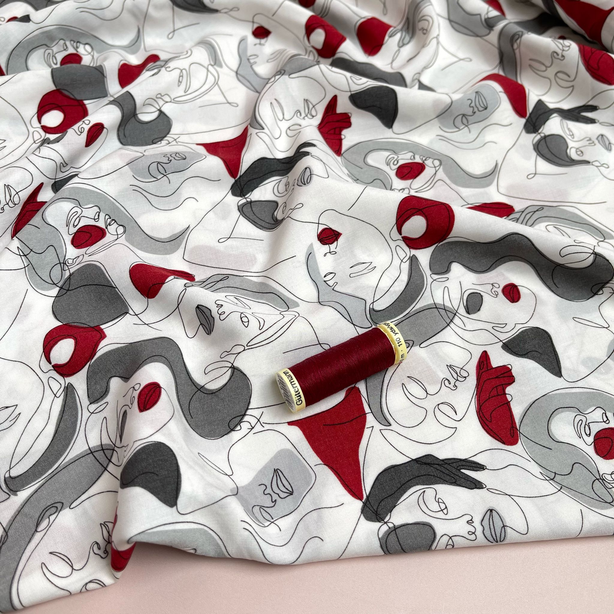 REMNANT 1.88 Metres - Faces on Grey Viscose Fabric - Image 6