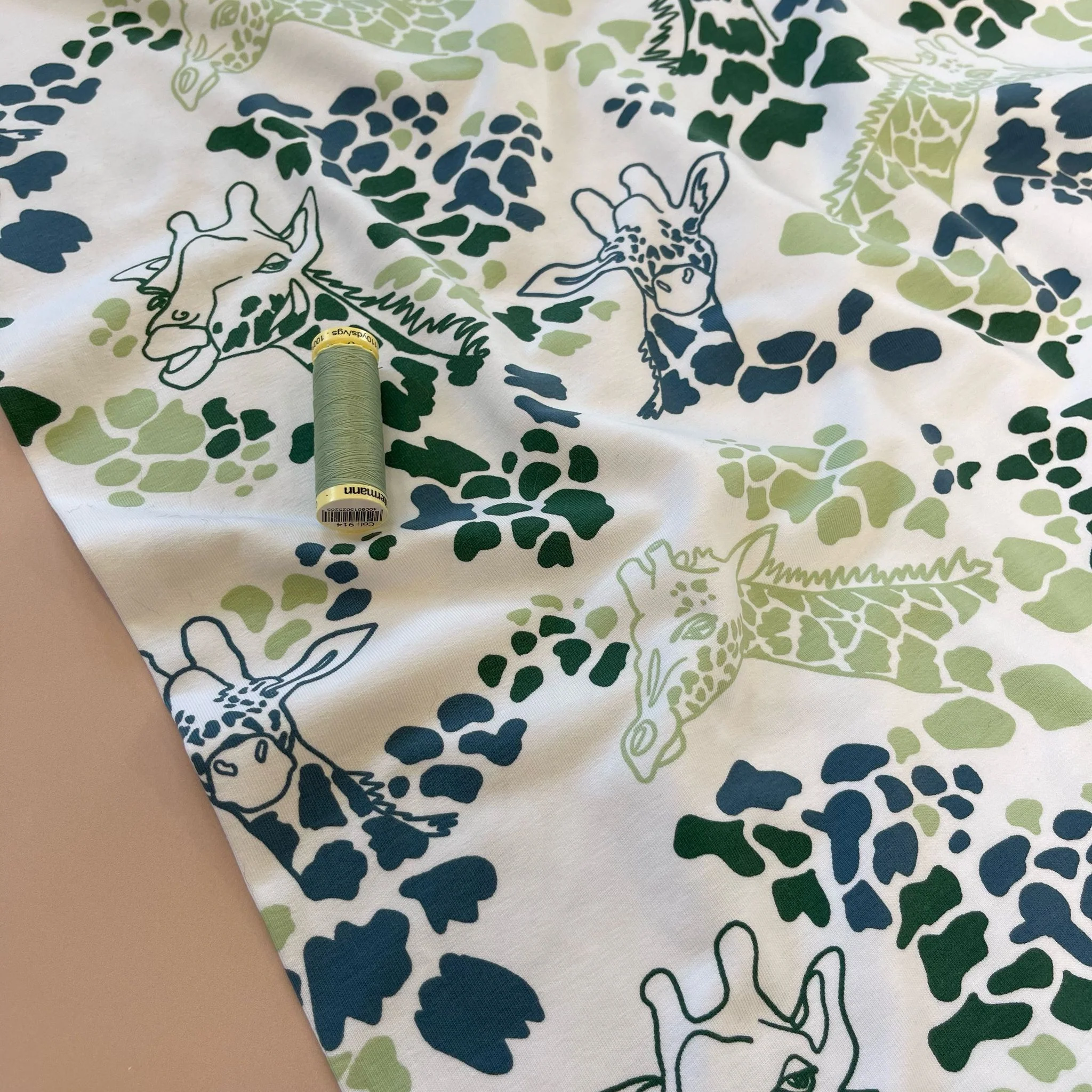 Giraffe's in Green Cotton Jersey Fabric - Image 6