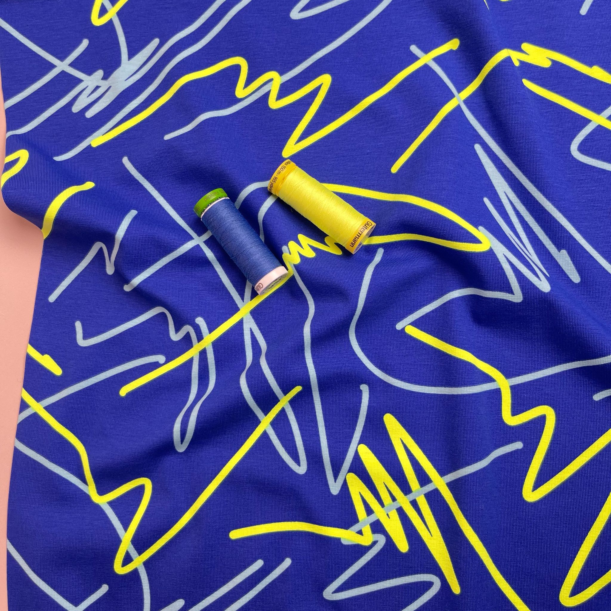Neon Doodles on Blue Cotton Jersey Fabric - Image 6