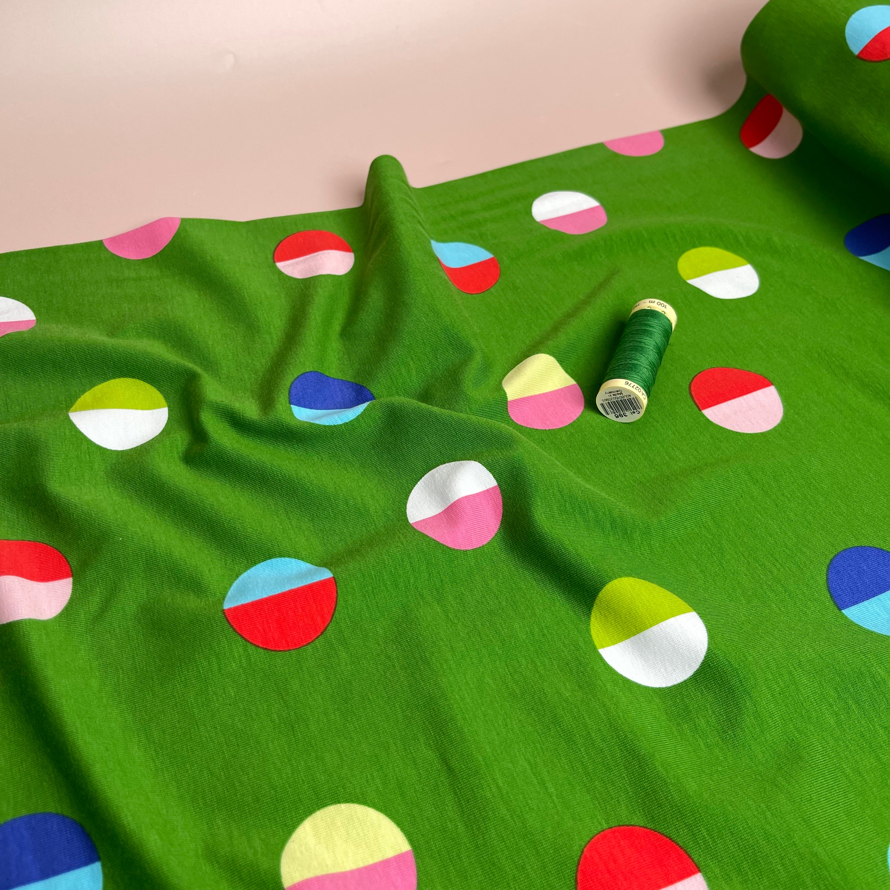 Split Circles on Green Cotton Jersey Fabric - Image 3